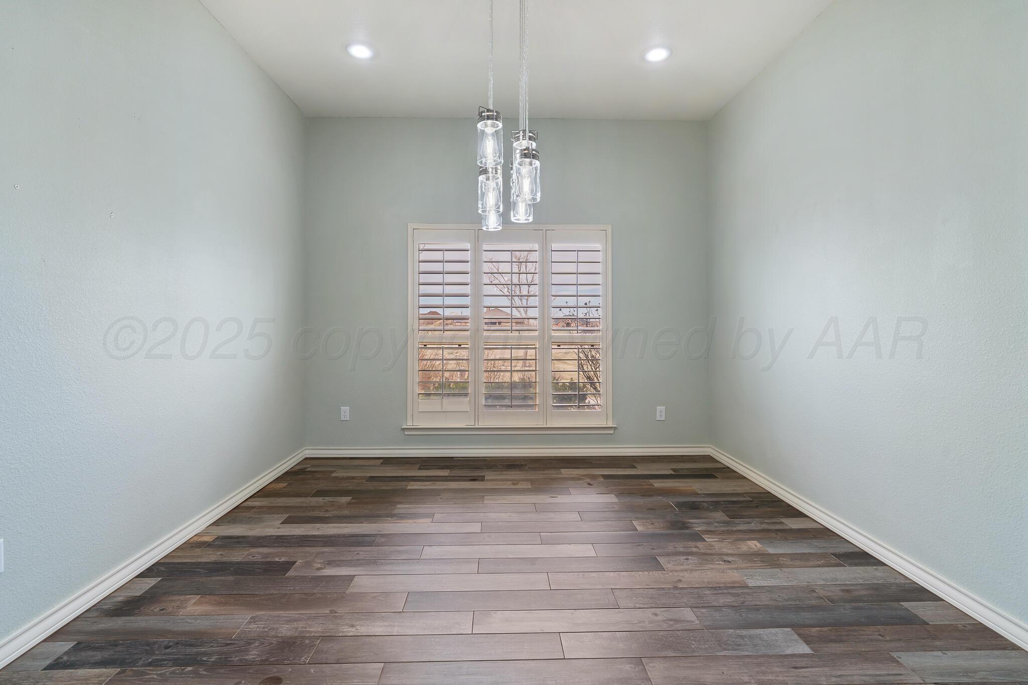 18451 Copper Ridge Bushland, TX 79124 - Photo 17 of 50 a view of empty room with wooden floor and fan