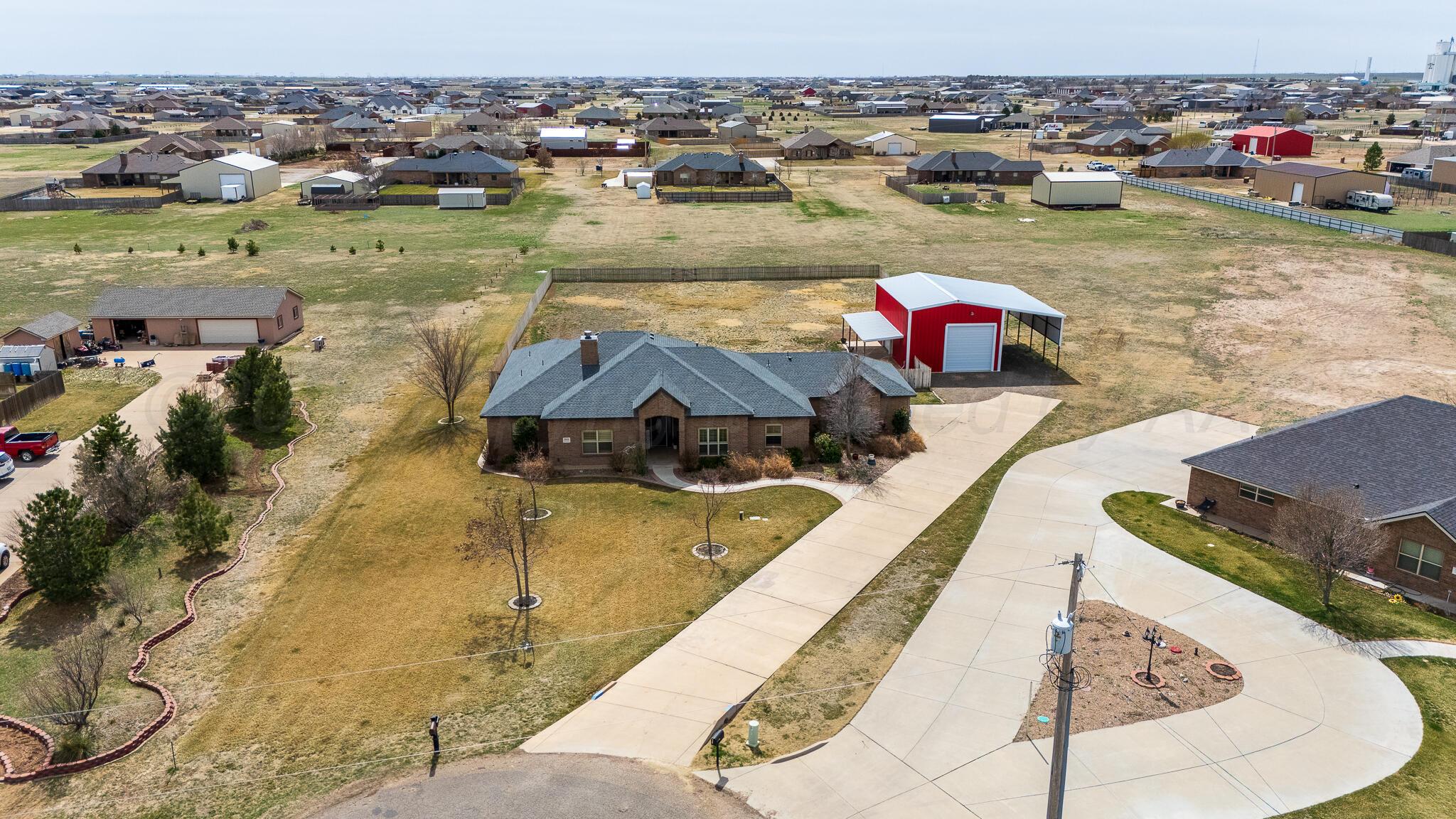 18451 Copper Ridge Bushland, TX 79124 - Photo 2 of 50 an aerial view of a house with a swimming pool
