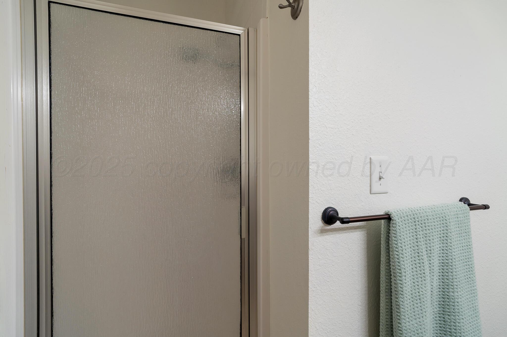 18451 Copper Ridge Bushland, TX 79124 - Photo 26 of 50 a bathroom with a shower