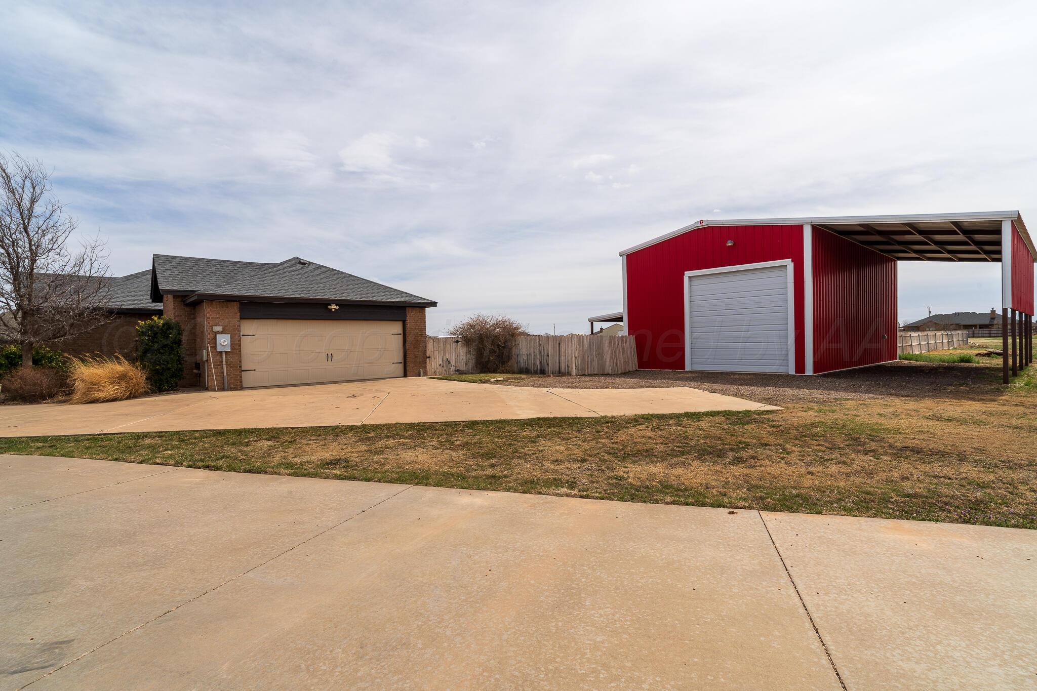 18451 Copper Ridge Bushland, TX 79124 - Photo 38 of 50 a front view of a house with a yard