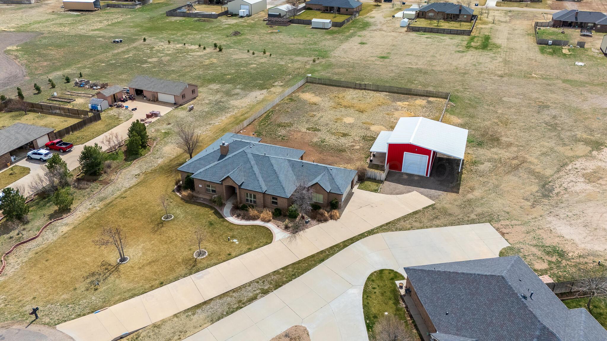 18451 Copper Ridge Bushland, TX 79124 - Photo 44 of 50 a view of a swimming pool with a yard