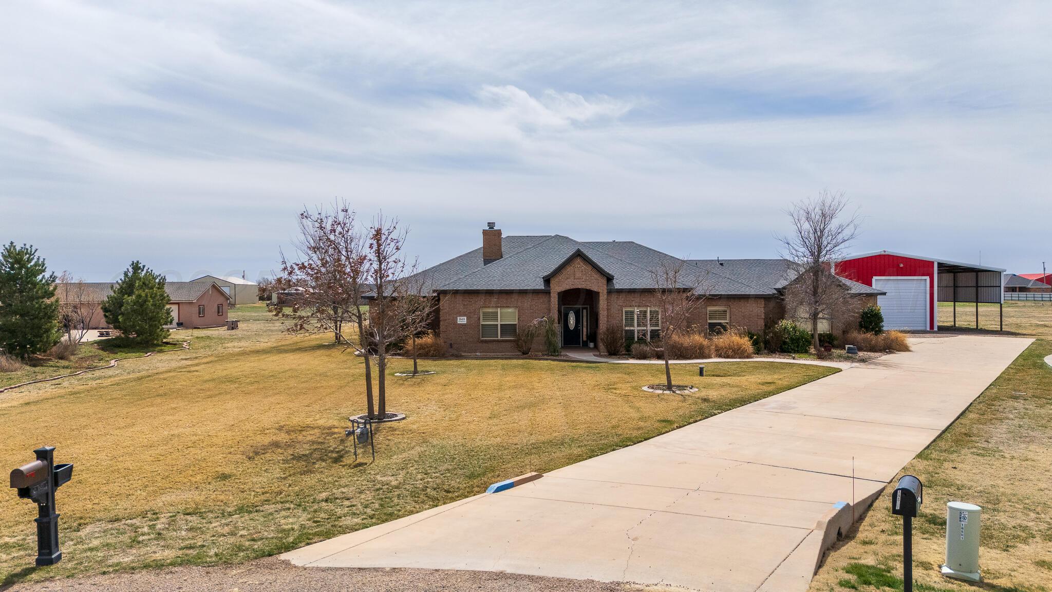 18451 Copper Ridge Bushland, TX 79124 - Photo 47 of 50 a front view of house with yard