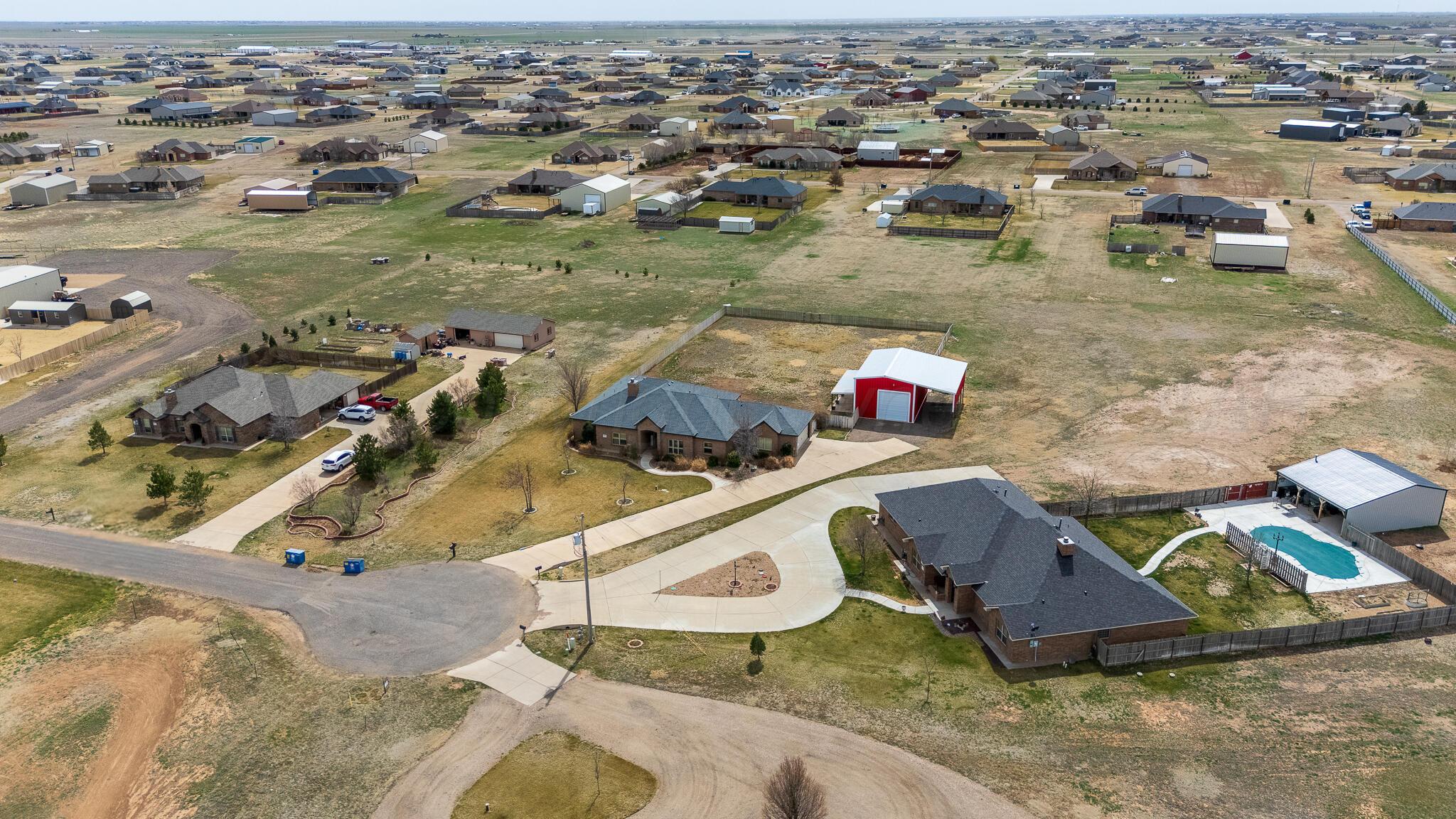 18451 Copper Ridge Bushland, TX 79124 - Photo 48 of 50 an aerial view of a house with a swimming pool