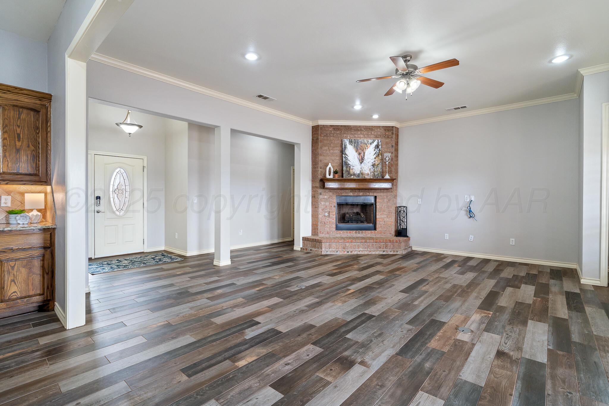 18451 Copper Ridge Bushland, TX 79124 - Photo 8 of 50 a view of an empty room and fire place