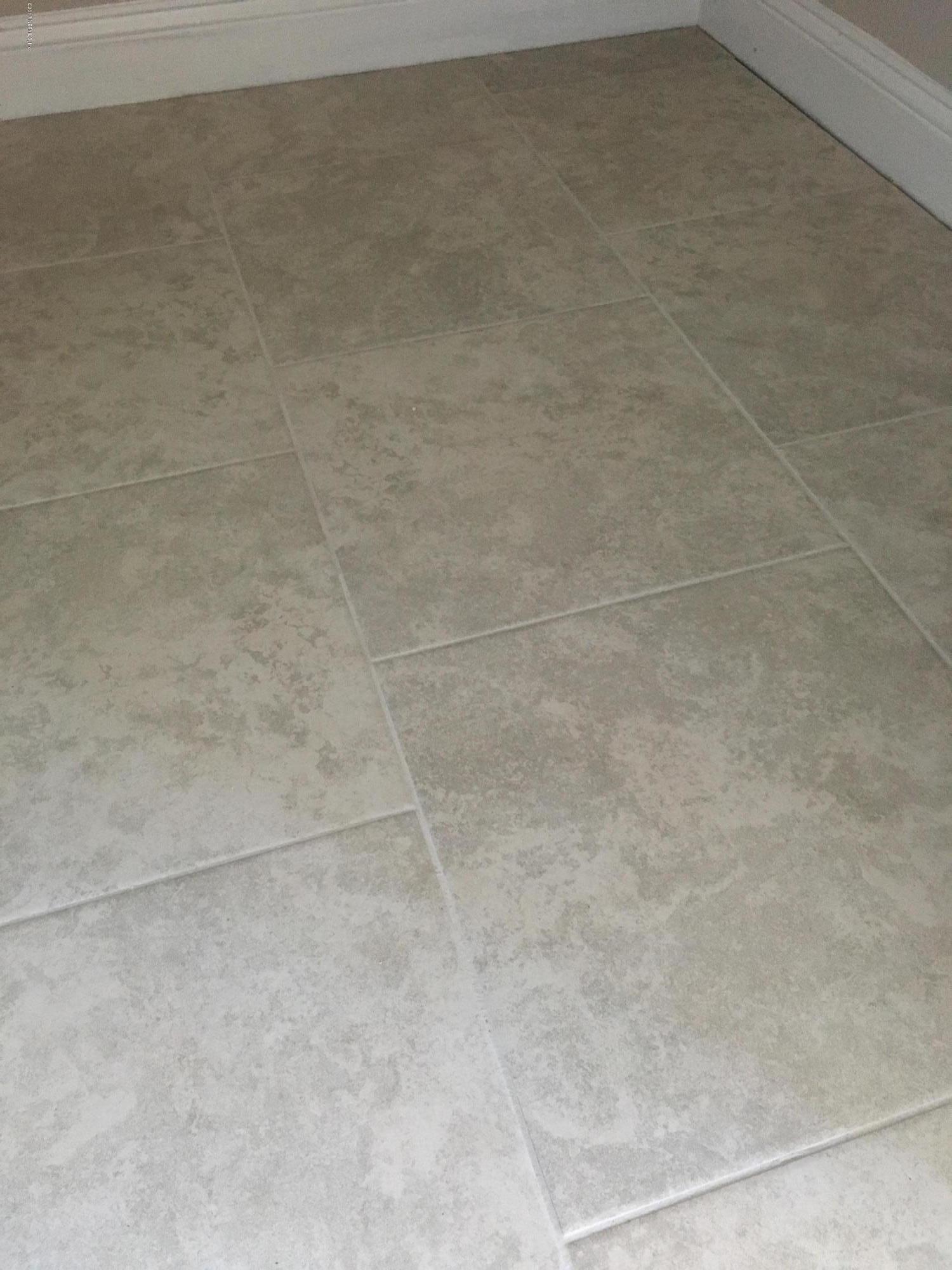 332 Rambling Water Run St. Johns, FL 32259 - Photo 23 of 36 18x18 Tile throughout main living areas