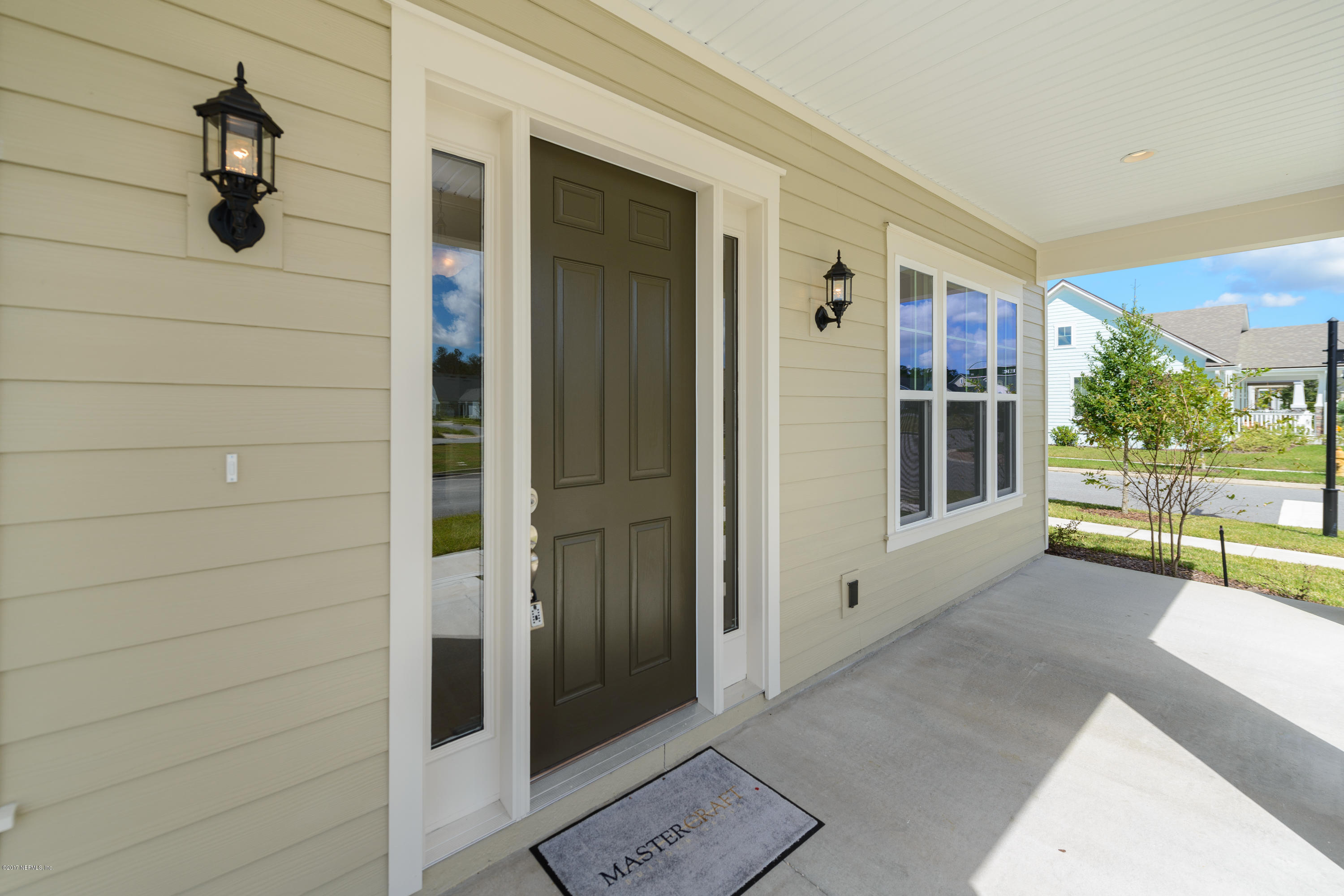 332 Rambling Water Run St. Johns, FL 32259 - Photo 25 of 36 front door with sidelights
