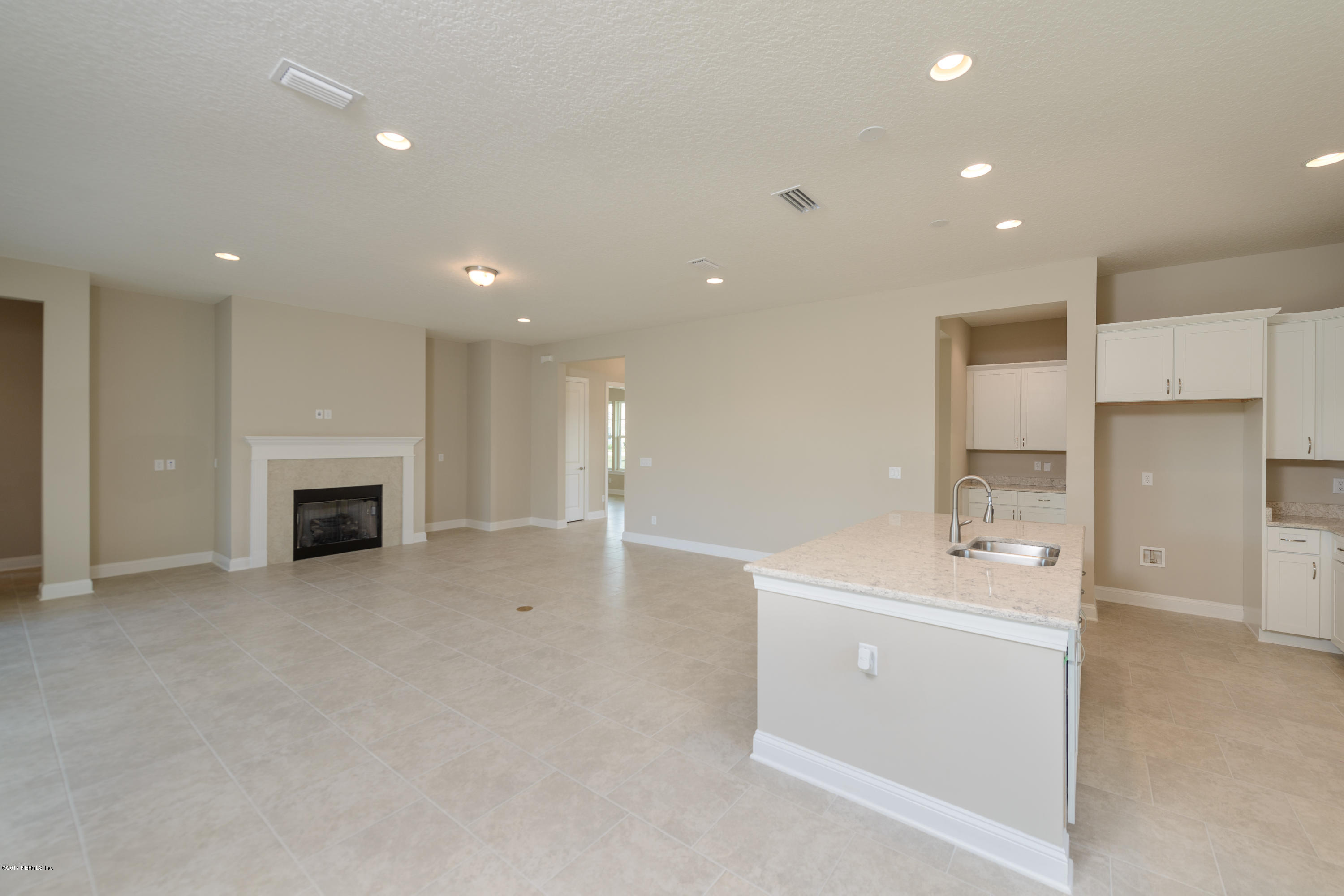 332 Rambling Water Run St. Johns, FL 32259 - Photo 6 of 36 kitchen to family room