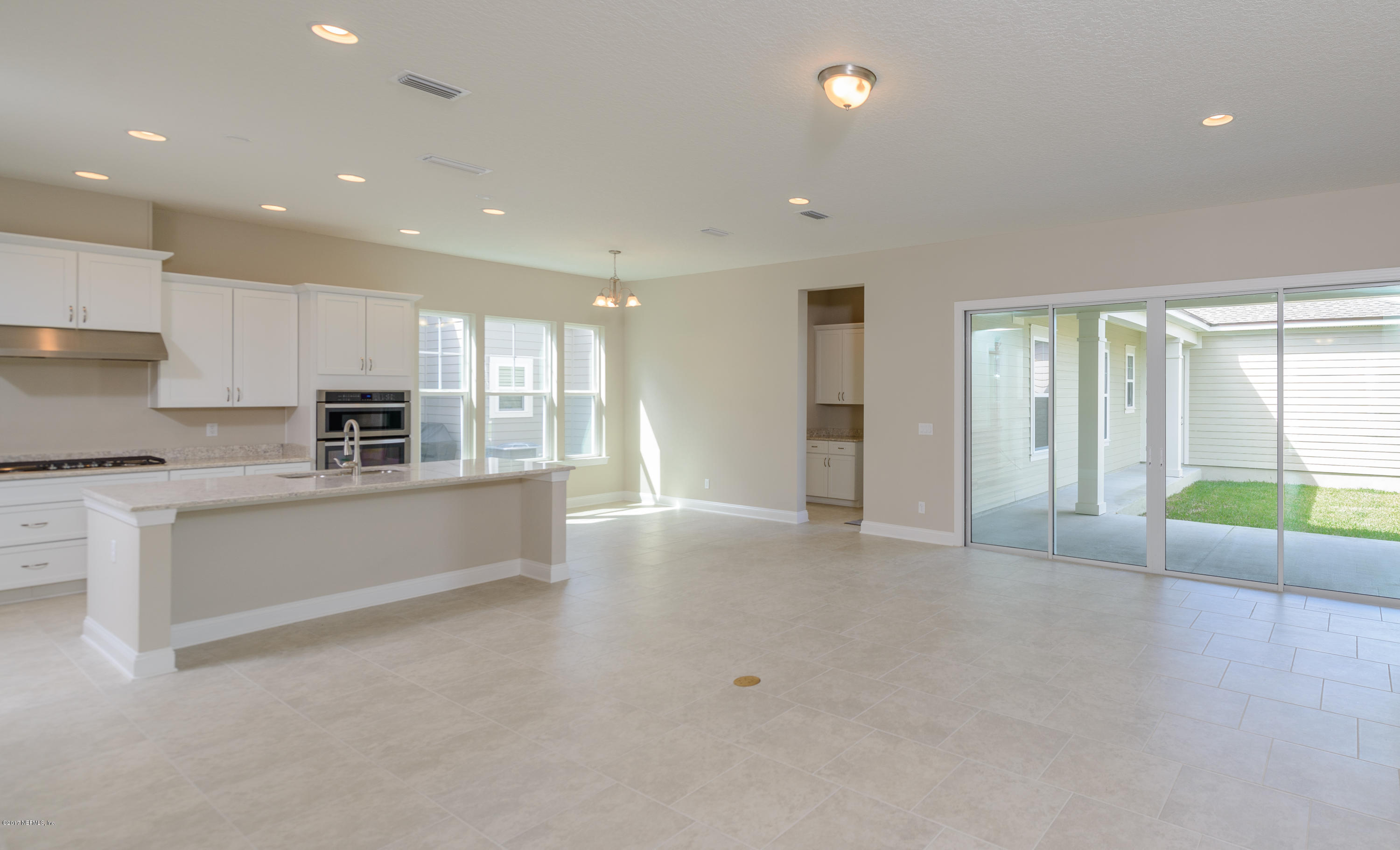 332 Rambling Water Run St. Johns, FL 32259 - Photo 8 of 36 large family room with ample light