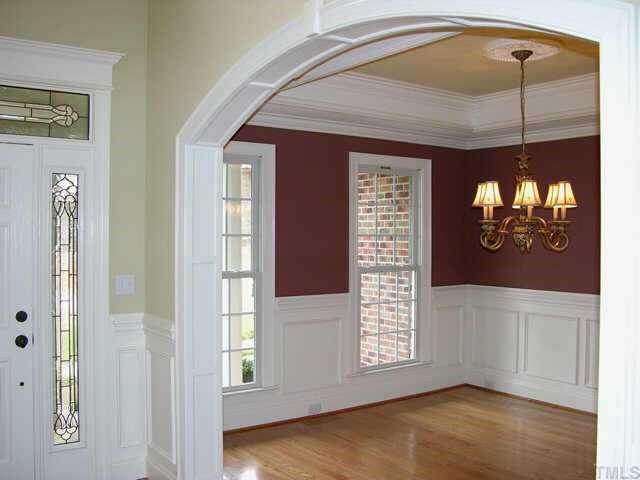 3313 Cotton Road Raleigh, NC 27601 - Photo 7 of 10 a view of an entryway with a chandelier