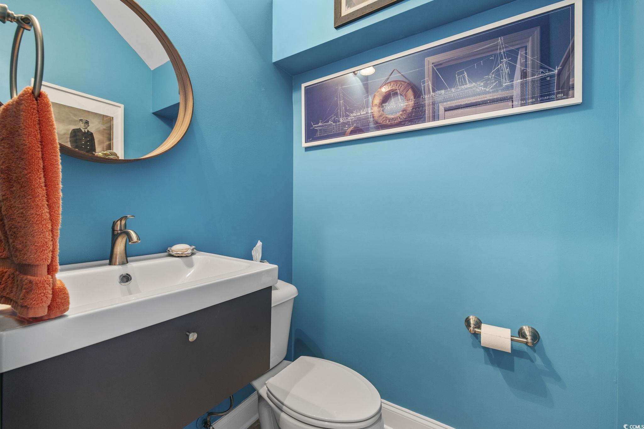 718 Shine Avenue, Unit 718 Myrtle Beach, SC 29577 - Photo 17 of 36 Bathroom with vanity and toilet