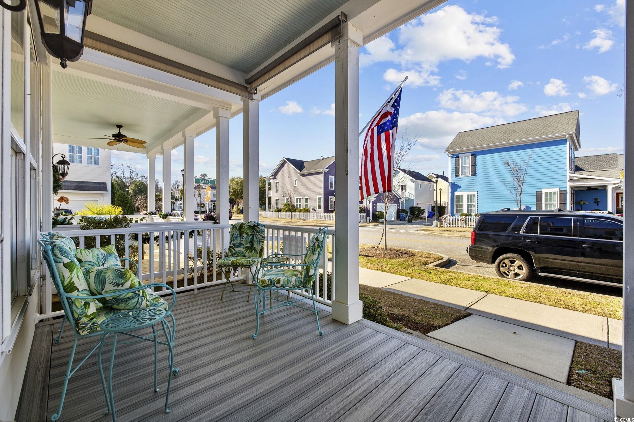 718 Shine Avenue, Unit 718 Myrtle Beach, SC 29577 - Photo 4 of 36 Porch featuring a residential view