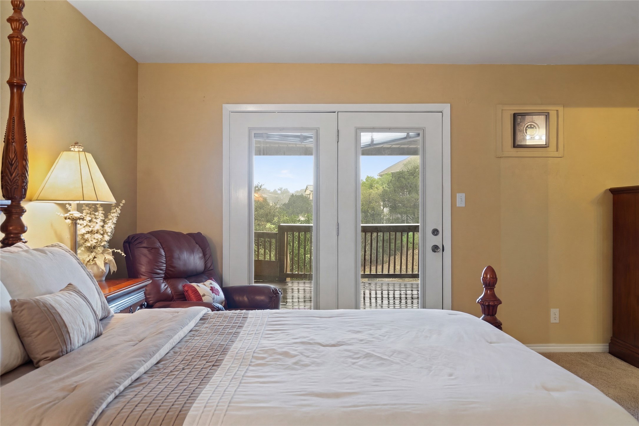 317 Venture Boulevard South Point Venture, TX 78645 - Photo 11 of 17 a bedroom with a bed and wooden floor