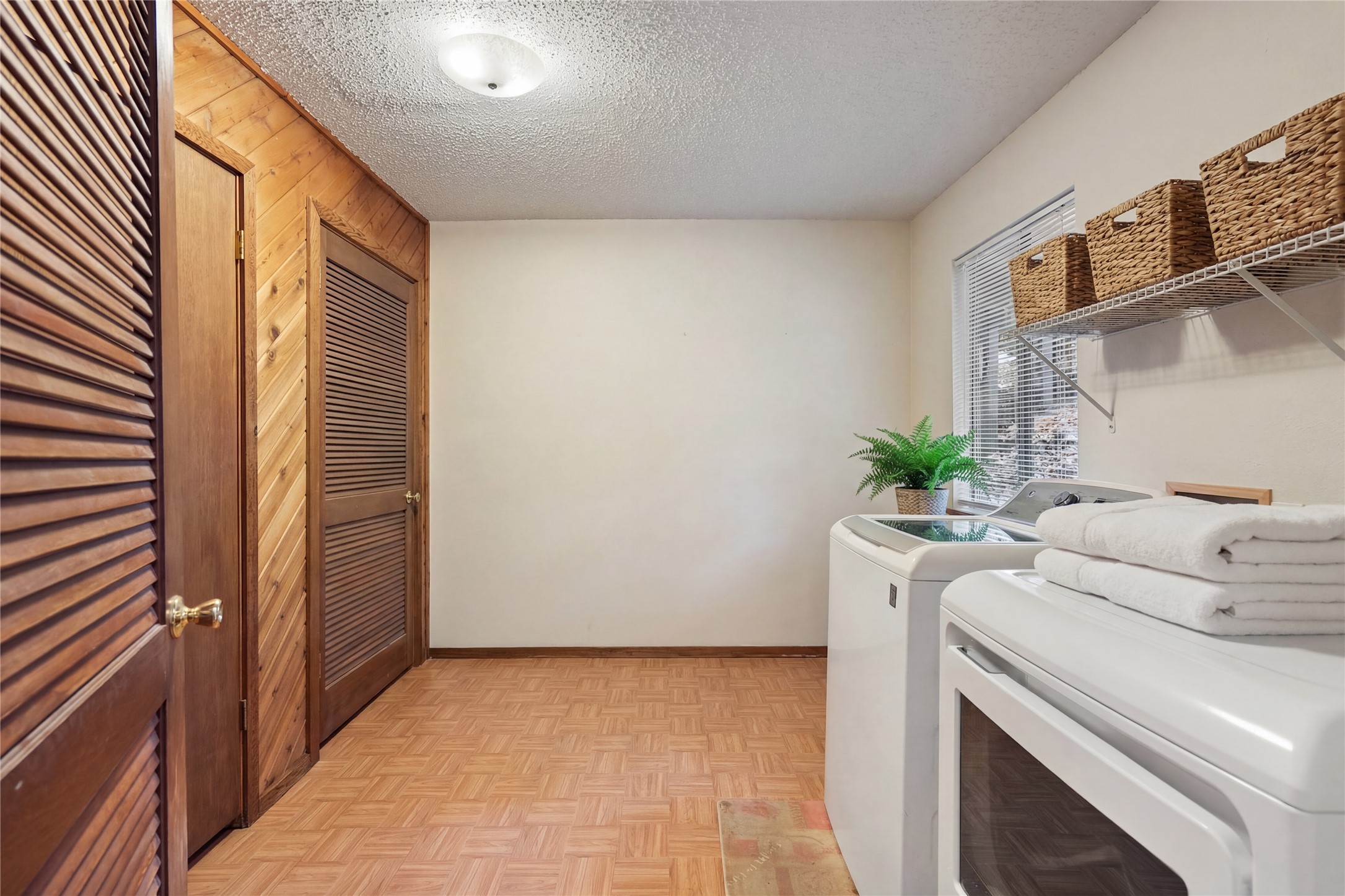 317 Venture Boulevard South Point Venture, TX 78645 - Photo 8 of 17 a utility room with dryer and washer