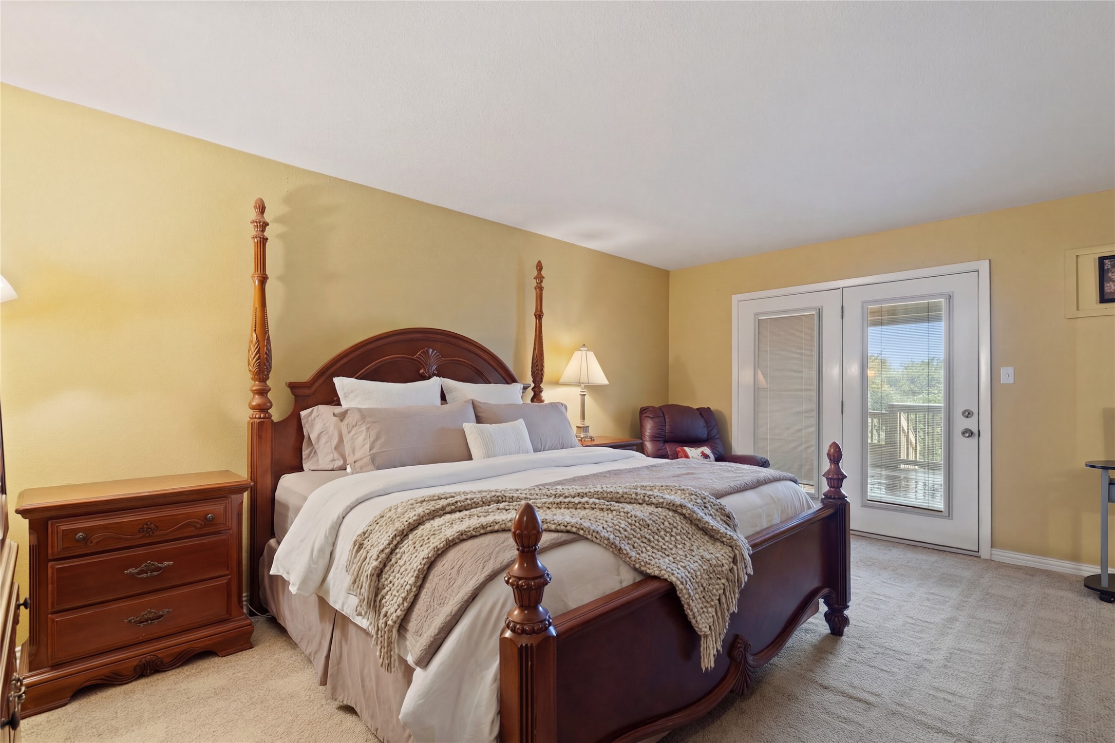 317 Venture Boulevard South Point Venture, TX 78645 - Photo 10 of 17 a bedroom with a bed and a dresser