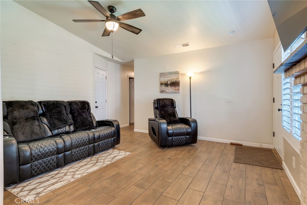 3198 Bexfield Court Riverside, CA 92503 - Photo 5 of 33 Living Room with Ceiling Fan and Recessed Lights