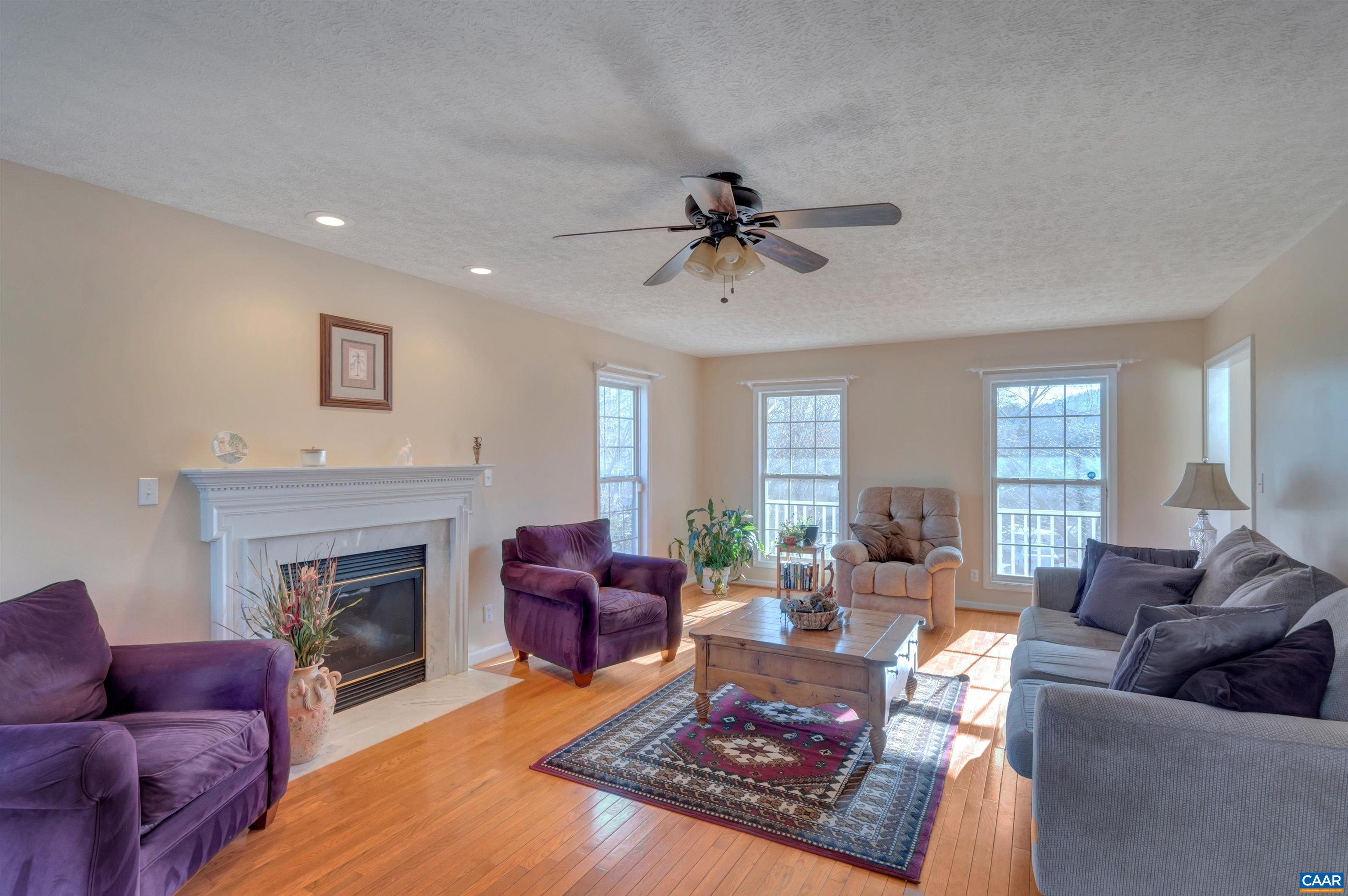 222 Starcrest Road Charlottesville, VA 22902 - Photo 11 of 46 a living room with furniture a fireplace