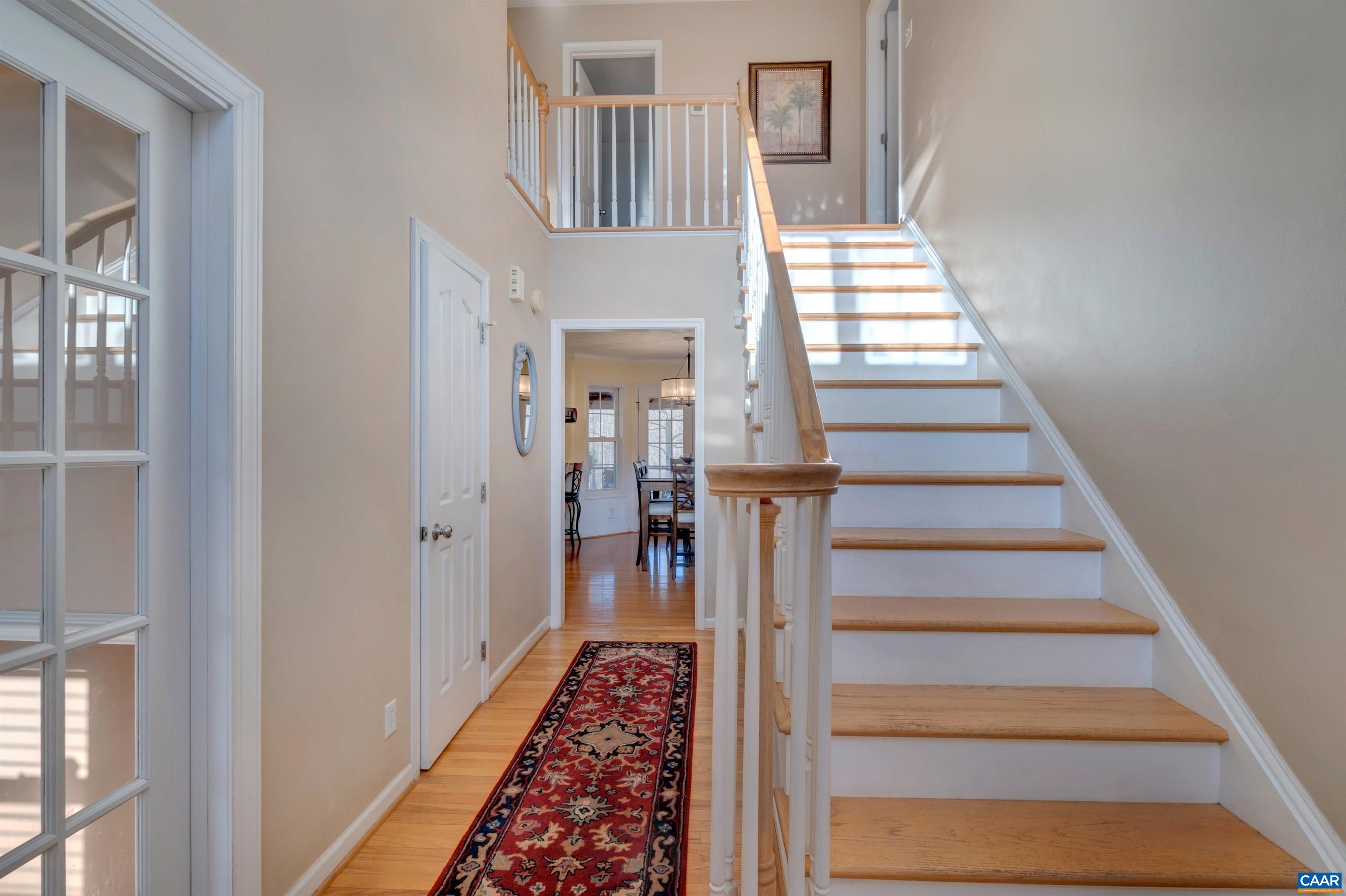 222 Starcrest Road Charlottesville, VA 22902 - Photo 23 of 46 a view of entryway and hall with wooden floor