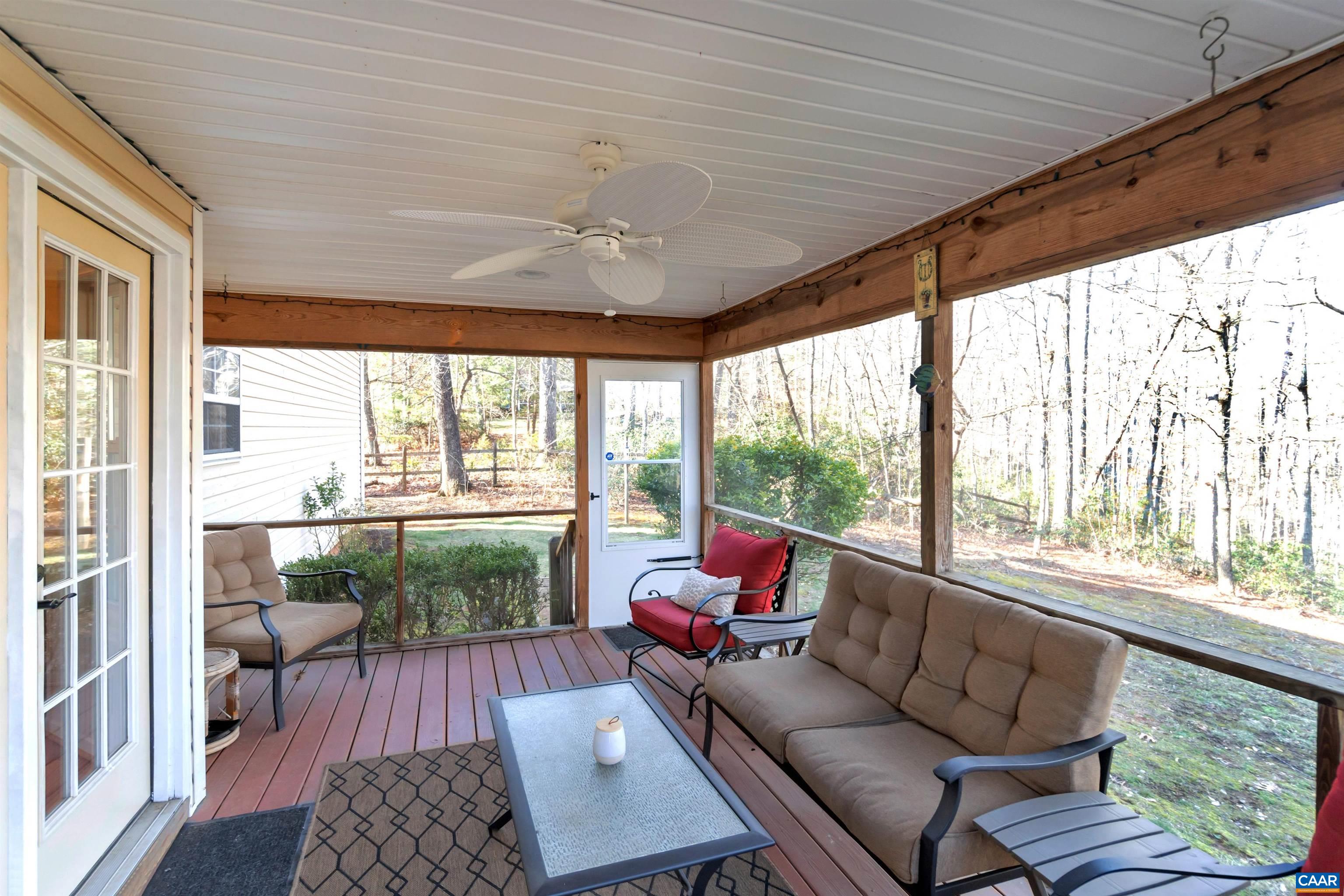 222 Starcrest Road Charlottesville, VA 22902 - Photo 35 of 46 a living room with furniture and a large window