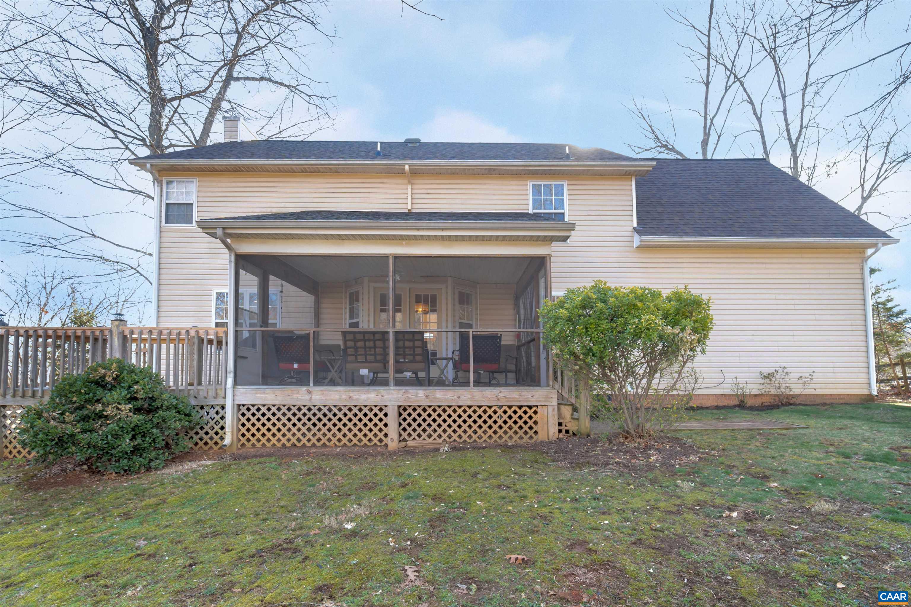 222 Starcrest Road Charlottesville, VA 22902 - Photo 36 of 46 a view of a house with a small yard and plants