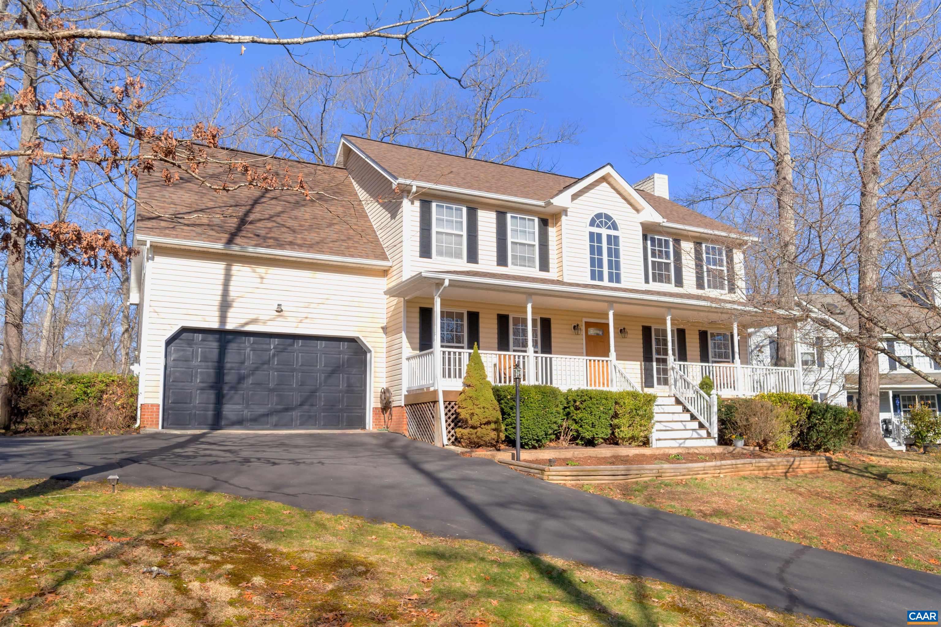 222 Starcrest Road Charlottesville, VA 22902 - Photo 5 of 46 a front view of a house with a yard