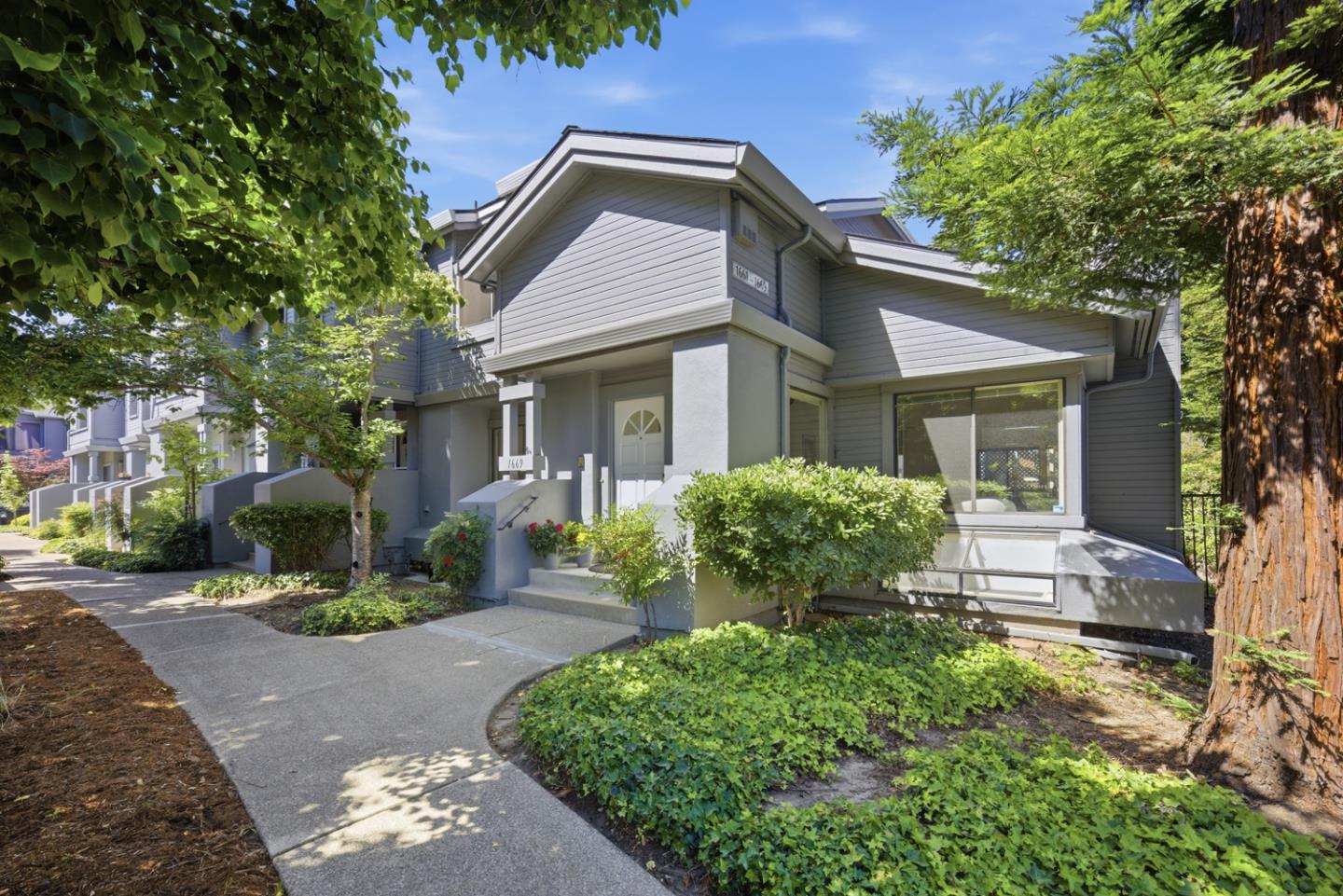 1669 Geary Road Walnut Creek, CA 94597 - Photo 1 of 39 a front view of a house with a yard