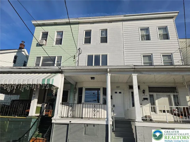 a view of a house with a balcony
