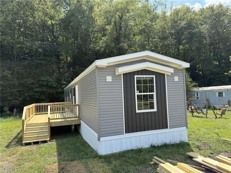 206 Iron Furnace Road East Brady, PA 16028 - Photo 3 of 15 a front view of a house with a yard