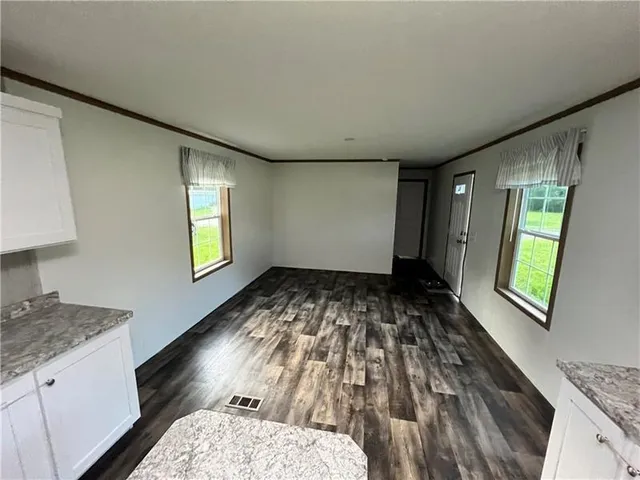 a view of an empty room and window