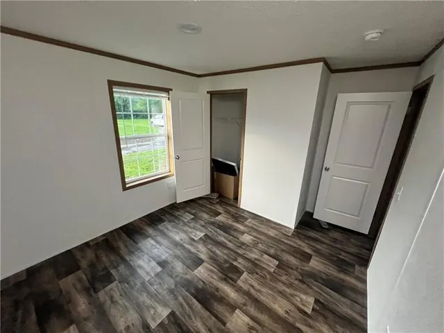 a view of empty room with front door