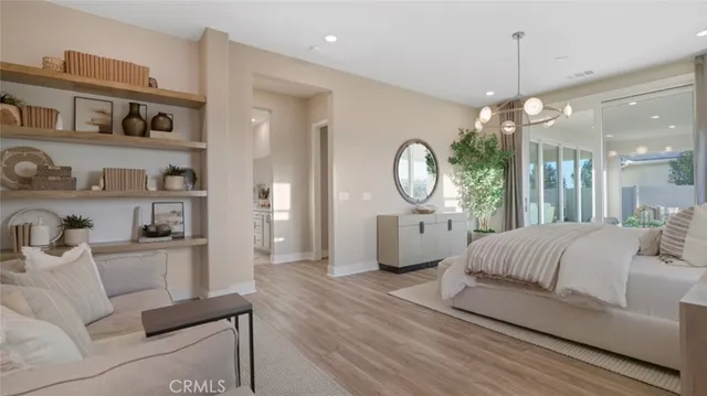 a living room with furniture a lamp and a window