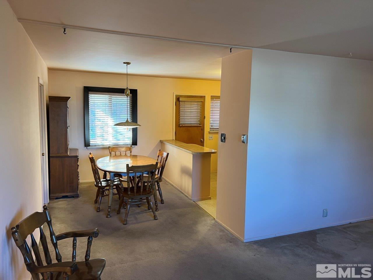 735 Reeves Avenue Reno, NV 89503 - Photo 3 of 15 a view of a dining room with furniture and window