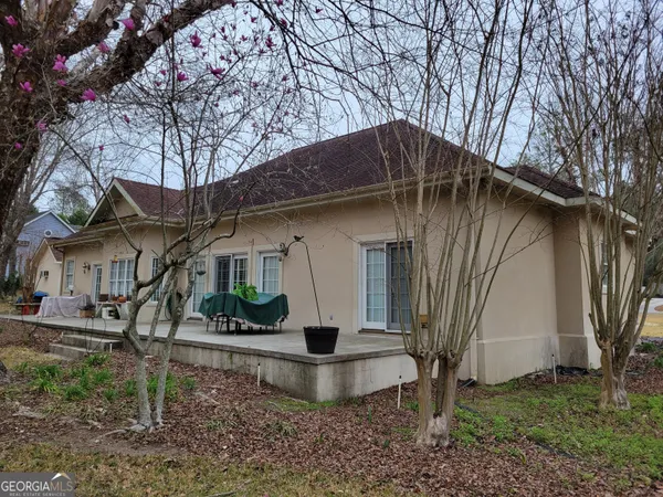 a shelf with books and knick knacks on it