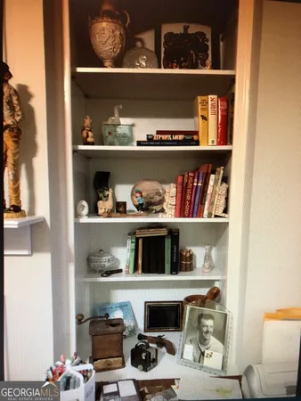 a view of a livingroom with furniture and a living room