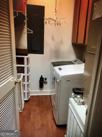 a kitchen with stainless steel appliances a refrigerator sink and cabinets