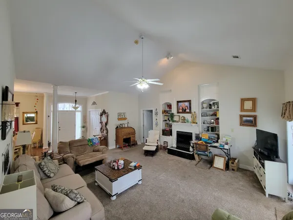 a bathroom with a sink vanity and a mirror