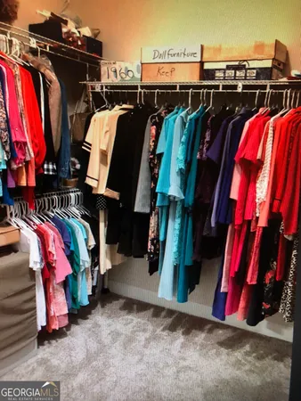 a view of a storage & utility room with closet