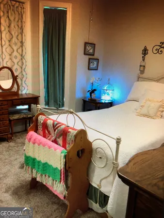 a spacious bathroom with a bathtub and toilet