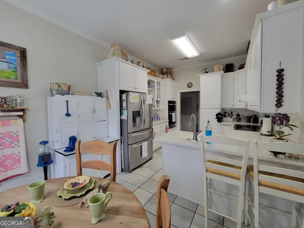 a room with a washing machine and sink