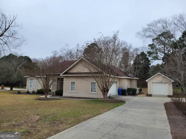 a table and chairs in a patio