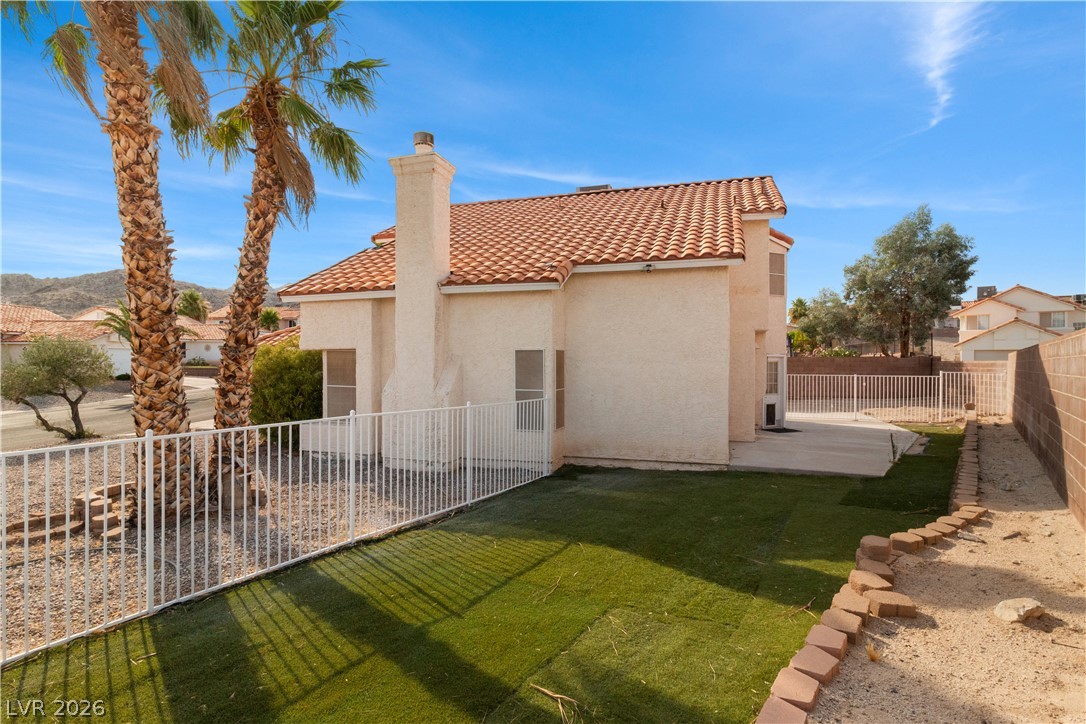 3156 Terrace View Drive Laughlin, NV 89029 - Photo 63 of 94 A well-maintained yard provides a tranquil outdoor retreat with desert landscaping.