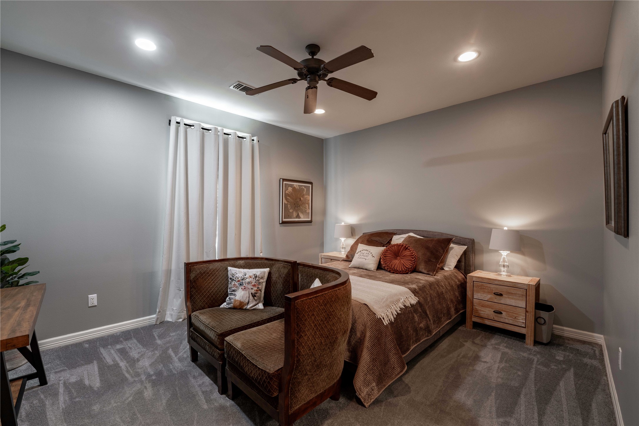 1820 Guenther Road La Grange, TX 78945 - Photo 16 of 29 a bedroom with a bed and a ceiling fan