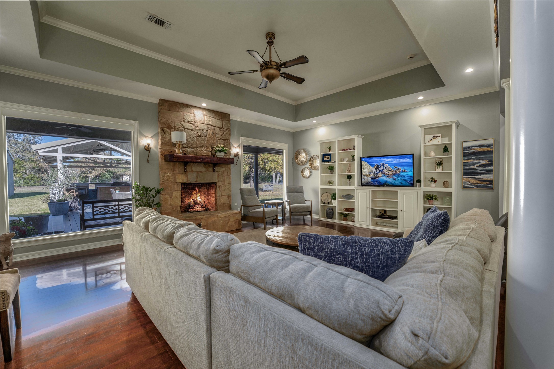 1820 Guenther Road La Grange, TX 78945 - Photo 3 of 29 a living room with fireplace furniture and a flat screen tv