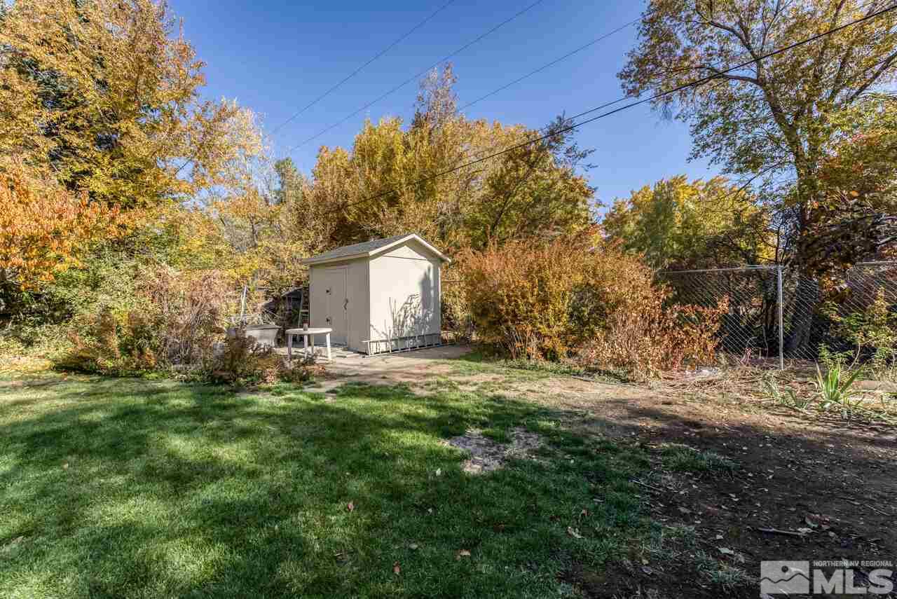 160 Circle Drive Reno, NV 89509 - Photo 24 of 25 a backyard of a house with lots of green space