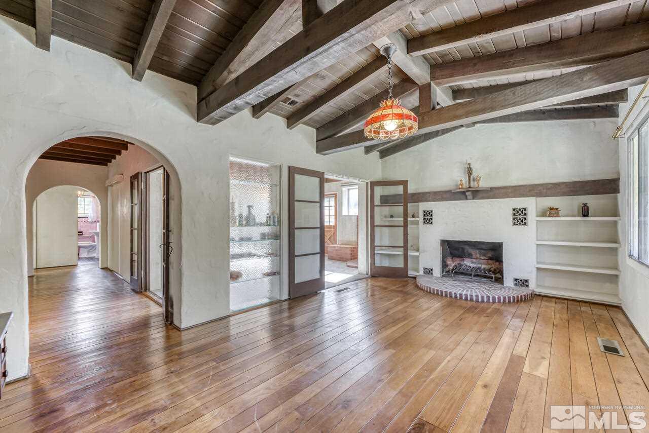 160 Circle Drive Reno, NV 89509 - Photo 4 of 25 a view of livingroom with fireplace wooden floor and furniture