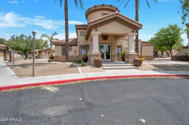 an aerial view of residential house with outdoor space and swimming pool