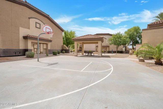 a view of a building with sitting area