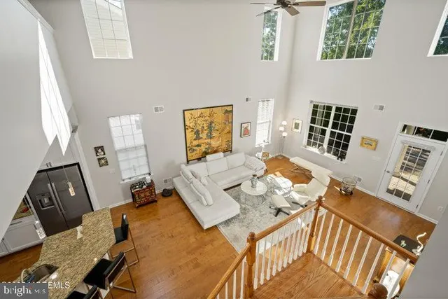 a view of a workspace with furniture and a couch