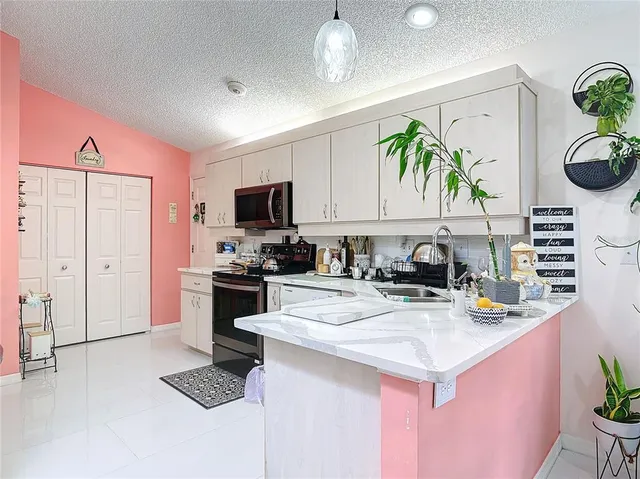 a bathroom with a sink toilet and a mirror