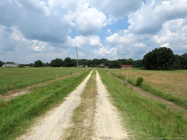 a view of a lake with a big yard