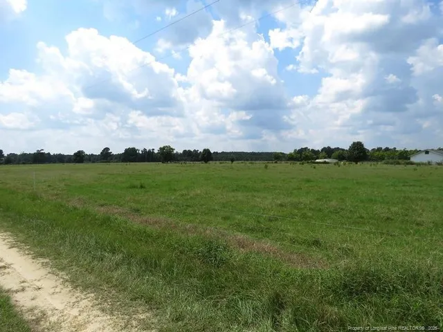 a view of a lake with a big yard